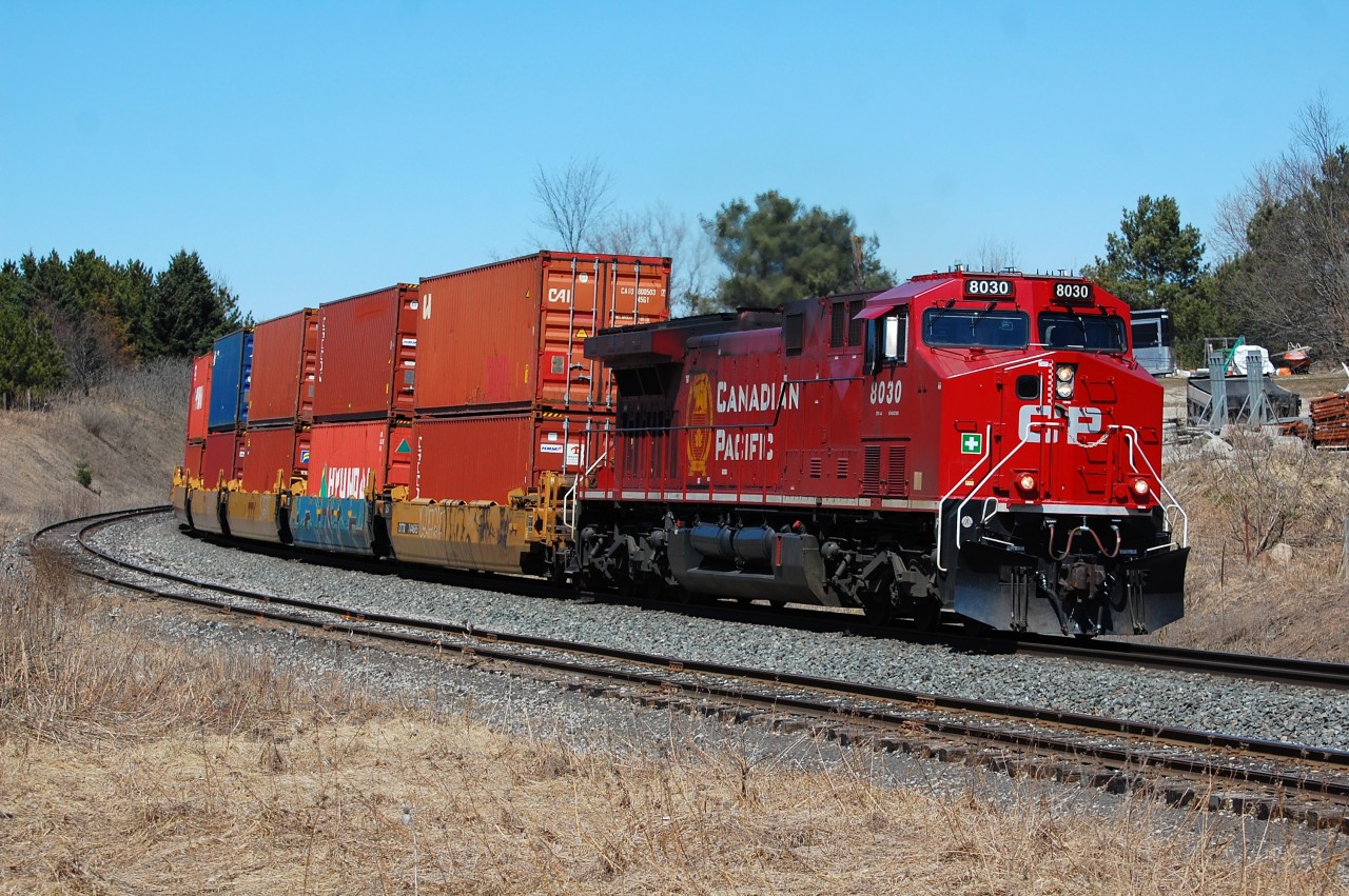 CP 8030 South leads an Intermodal train with DPU at Palgrave on the CP Mactier Sub during the early spring of 2019.