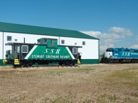 An exCN PSC caboose is a fine display piece outside the the Stewart Southern Railway's shop near Fillmore Saskatchewan.  