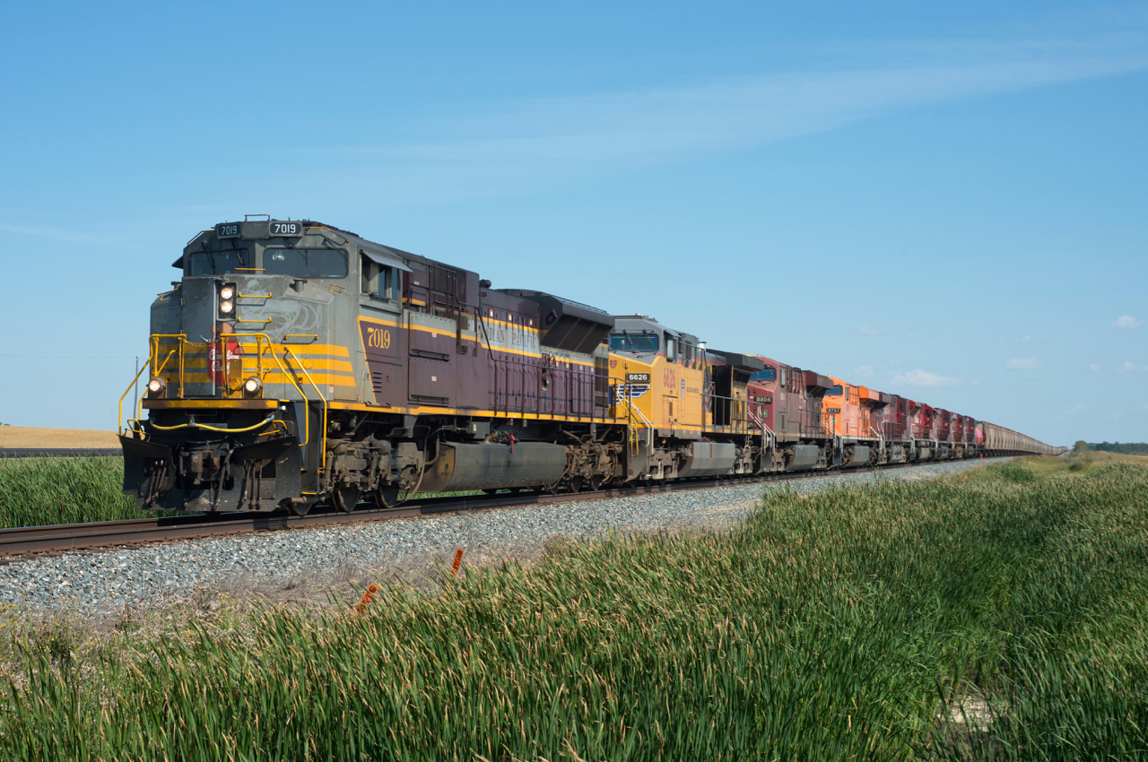 CP 618-139 is almost at it's destination of Alwinsal Mine just south of Guernsey SK with nine units on the head end.  The 7019 has gained a fair bit of grime since it's stint on the business train last year.
