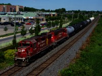 CP GP38-2s with the two versions of CP's beaver paint scheme (CP 3100 & CP 4429) are the power on CP G95.