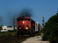 A smokey Dash9-44CWL leads CN 435 past Goreway.