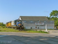 582 makes a switch next to the planing mill belonging to Knight Lumber in Guelph.  Today the mill is long
gone as is the GEXr.