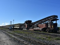 Well, it just wouldn't be me if I didn't sneak in a Work Equipment image among all those uncharacteristic (for me) station photos I've been posting the last few weeks. :-)
GREX 2700 was one of two GREX Dump Trains (GREX 2400 being the other) working out of HBR's Churchill, MB yard each day I was in the northern Manitoba town. Train after train of crushed material left the yard each morning to be dumped along the right-of-way south of town. On my trip into and out of Churchill on VIA 693 & 692, I noticed several Harsco MK IV tampers and Knox Kershaw ballast regulators surfacing track that had been flooded with fresh crushed ballast. The wye at Churchill South was having new rail installed, and a bulkhead flat (UCRY 873032) of new track ties was being unloaded in the yard at Churchill as well. There was no shortage of manpower, vehicles, or equipment (both HBR & contractors) in Churchill, which made it quite clear there was a tremendous effort being made to rehabilitate and upgrade this portion of the HBR's Herchmer Subdivision. While it was interesting and exciting to see all the equipment and work going on, I was also quite content to be on the retired side of my railroad career.