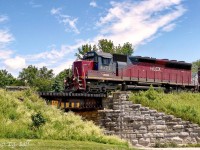 Leased power leads GEXR 581 as they cross Parrs Line in holmesville.