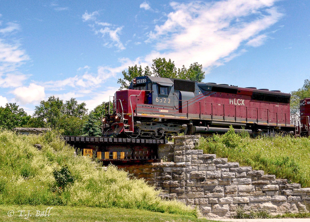 Leased power leads GEXR 581 as they cross Parrs Line in holmesville.