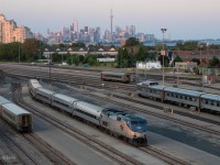 Amtrak 119 seen pulling a 5 car set of amfleets into VIA Rail's Toronto Maintenance centre. 