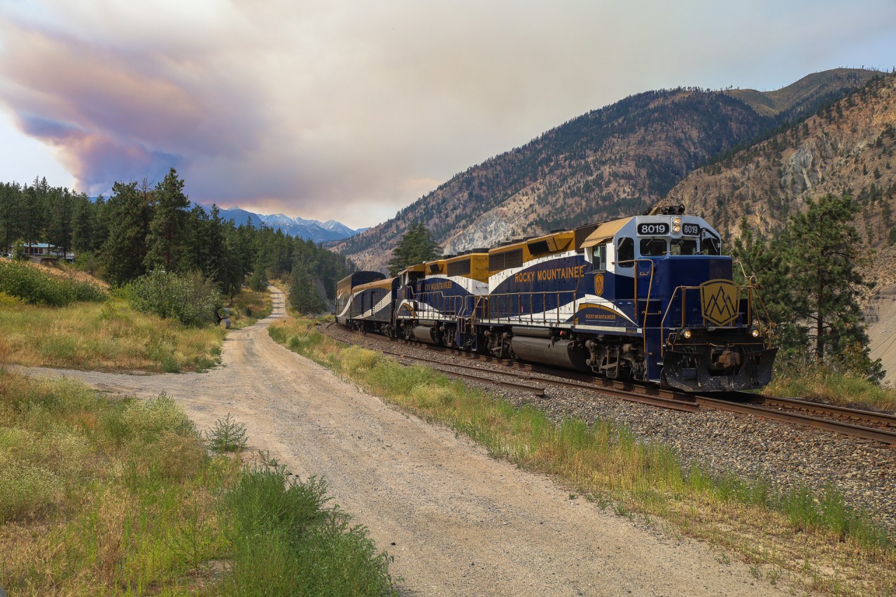 Just over a year after the devastating fire in Lytton BC, the eastbound Rocky Mountaineer highballs past Gladwin as another fire rages just north of Lytton