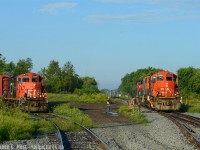 On my way into work a surprise finding both L542 and L540 by Alma St in Guelph first thing in the morning and both with matching GP9's. It's just before 0800 and 540 (7071) is on the mainline, about to reverse out of the way into XW12 then into XV yard.  542 (7025) has to take a couple switches in hand to cross over to follow 540, and both trains will head into XV yard and exchange cars - and an engine: 4790 donated from 540 to 542. I've never seen 540 in Guelph this early since as they usually come from Kitchener. 542 usually arrives by the crack of dawn though from Galt when they start there.