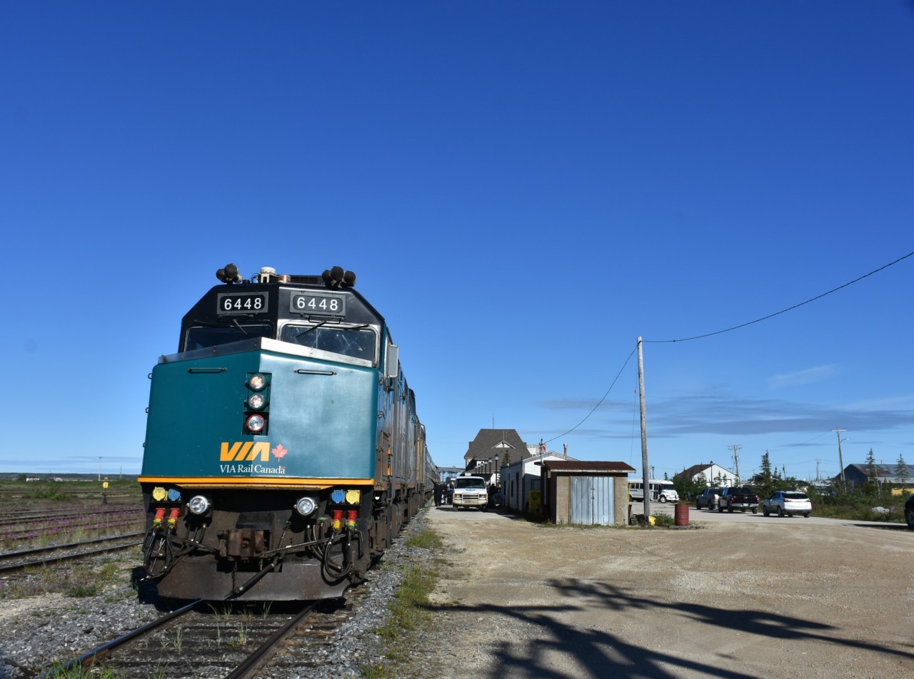 VIA 6448 has backed train #693 into the station for a 09:00 on-time arrival after it's overnight trek from Gillam, MB to Churchill, MB with another trainload of folks eager to explore the northern Manitoba town and surroundings. Passengers have detrained and the trucks and vans from local tour operators line up to gather the new group of sightseers and their luggage. The station platform, parking lot, and roadway at the front of the station are a beehive of activity while the HBR yard on the engineers side of 6448 is void of any movement. This scene will quickly reverse once the newly arrived passengers are whisked away to their respective motels and the HBR yard crew and MoW guys start a very busy day of car switching, tie unloading, and track maintenance. There was no shortage of interesting activity around the Churchill station or train yard each of the three days I was in town.