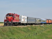 Ex CP GP9u 1624 ambles across the prairies with Aspen Crossing Railway's Champagne Brunch excursion