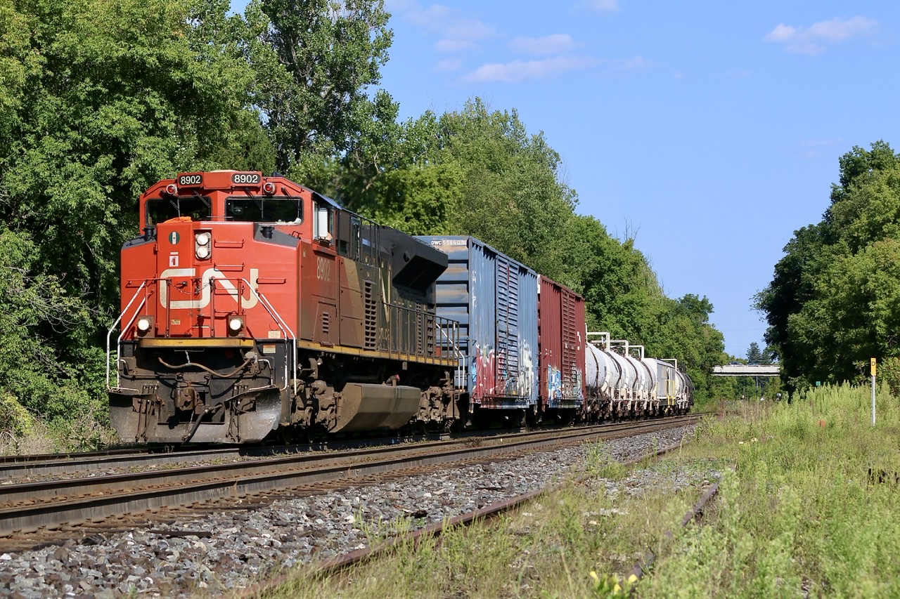 The weed spraying train snuck up on us after the passage of train 301 at Copetown. I was surprised this late in the summer the train was still out spraying the system, considering most weeds have now gone to seed. Not sure what the plan was for it as it was not spraying as it passed us.