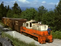 As a followup to my post last week showing Stuart Channel Transportation number 9 preparing to switch the SEASPAN DORIS rail ferry, here is a much closer view of that Whitcomb after the subsidiary was taken into the BC Forest Products entity and the unit painted in the corporate colours.  When the ferry slip was out of service for maintenance, BCFP took loads uphill to the E&N junction at Osborn Bay, and brought empties back down for a week, here on Friday 1980-06-13.