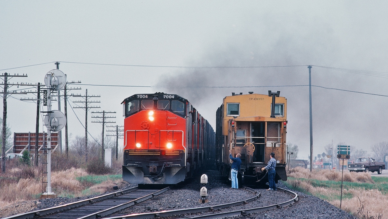 THIS IS RAILROADING....


    	employee instruction 

        2.0 SPEEDS

   	2.1 MAXIMUM SPEEDS UNLESS OTHERWISE RESTRICTED

	Other trains and engines...............60 MPH
   
   
   CP Rail #482 is progressing at track speed


   and a wave from the tail end crew of CP Rail #481, with Van 434451, greets the head end crew of CP Rail #482, BBD #7004 East.


    At east end of Sturgeon Falls siding mile 22.2  Cartier Subdivision, May 22, 1983 Kodachrome by S.Danko


    The BBD: HR616 Demonstrators #7004 – 7002 – 7001 – 7003 were on CP Rail  throughout 1983


   More BBD:


       from the bridge  


sdfourty