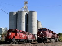 It is amazing how hard it has been over the years to catch a mainline train passing local H24 while it works Ardent. Seems like timing never co operates, that’s not to say there are ever a lot of trains around either, especially going in the right direction. The stars aligned today  as 236 storms westbound as H24 prepares to lift three hoppers out of the elevator.