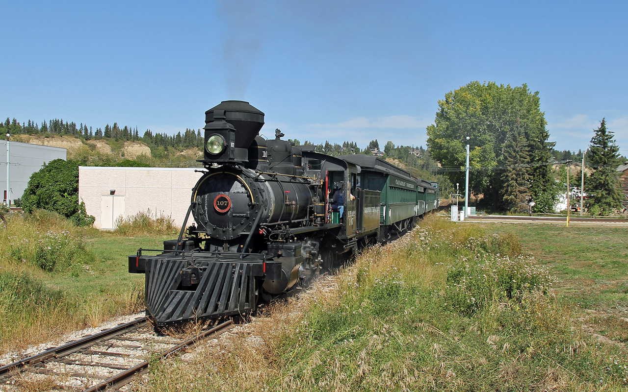 Locomotive 107 makes its way around the approximately 2 mile loop at Fort Edmonton Parks. The prairie type (2-6-2) locomotive was built in 1919 by the Baldwin Locomotive Works at Philadelphia, Pennsylvania for the Industrial Lumber Company in Oakdale, Louisiana. The locomotive was brought to Fort Edmonton Park in 1977, where it was rebuilt and converted to burn oil and went into service in 1978. The Edmonton Yukon & Pacific was the first railway built into Edmonton.