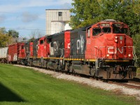 CN L568 heads down the Huron Park Spur crossing Queen Street in Kitchener with quite an impressive consist that included; 9639, 9416, 9449 and 7080. L568 was heading to the CP interchange to set-off and lift cars before heading to Guelph. October 24, 2021.