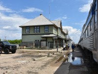 The ever ongoing exterior restoration of the CN Melville, SK station is evident in this June 8, 2022 photo, as it was during two previous trips on The Canadian in March of 2020, and December 2021. Scaffolding and leaning ladders still adorn the outside of the building behind a Frost security fence as passengers from VIA #2 mill about the puddled platform enjoying some fresh air and leg stretching. Meanwhile, a crew change is taking place up ahead at the lead locomotive. Of note, at the upper right corner of this photo is the original coal oil marker lamp hanger bracket still attached to the end of the Skyline car. I noticed a number of these brackets still adorning a variety of these old stainless steel cars on The Canadian equipment, and cars assigned to the Churchill trains as well. On many cars, these marker lamp fixtures had been removed and patched over with a stainless steel plate.