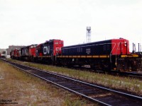 CN GP9 Slug 222, GP9RM 7221 and HR616’s 2109 and 2112 with GP9RM 4138 in the middle of the pair are viewed at CN’s MacMillan Yard during a cloudy September afternoon. 