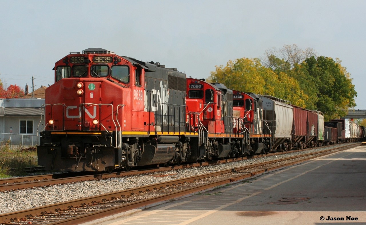 The Thanksgiving 2021 version of CN L568 is departing Kitchener, Ontario for Stratford on the Guelph Subdivision with 9639, 7080 and 4130. October 11, 2021.