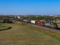Edmonton to Vancouver train 201-02 rolls through the southside of Edmonton with CP 6644, CP 8931 and CP 9820 on tailend.  