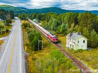 The northbound Agawa Canyon Tour train rolls through Searchmont, Ontario passing the foregone and dilapidated station. Built in 1902 it's the final station still standing along the line dating from the railroads construction. There had been an organization attempting to restore it but it seems like the attempts have fallen short as information is slim online and their website is no longer active.