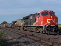 CN 394 blasts through the Brant County countryside between Brantford and Lynden.  Leading 394 is CN 3015, CN 3939 and ONT 1853.  I was quite surprised to see the same two CN units I had photographed several weeks before on 397 still together.