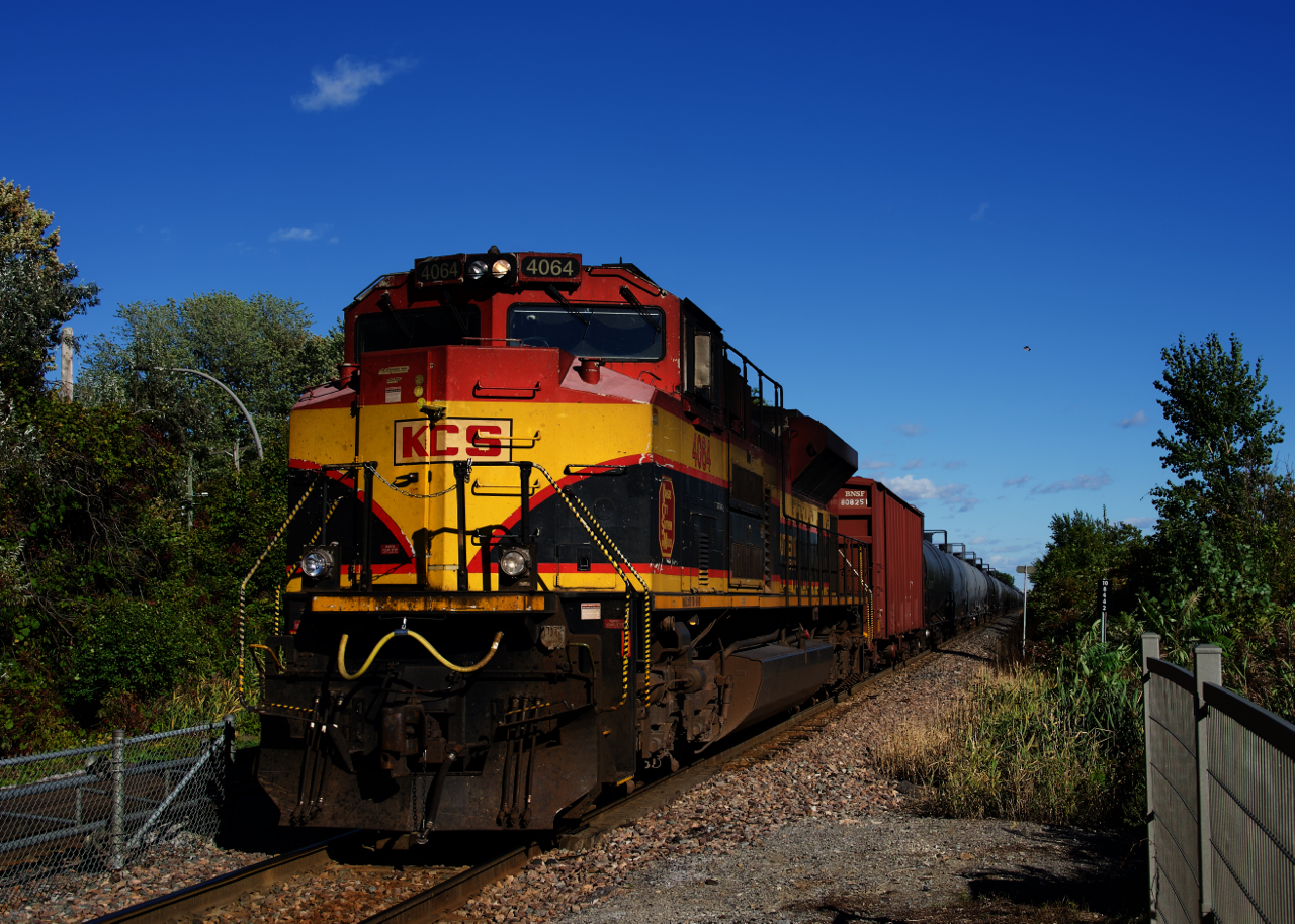 KCSM 4064 brings up the rear of ethanol train CP 528 just after it passed Pine Beach Station.