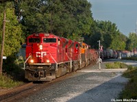 CP 421-10 has a 4-unit lashup and is seen here passing mile 4 of the MacTier Sub in some nice golden light.
