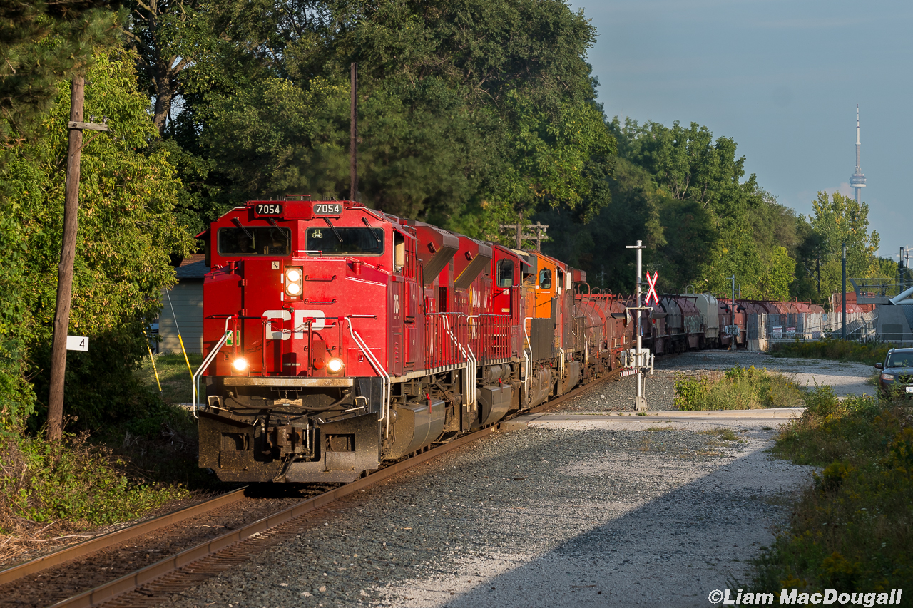 CP 421-10 has a 4-unit lashup and is seen here passing mile 4 of the MacTier Sub in some nice golden light.