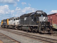 The power for ONR Train 211 sits in the yard at Englehart.  ONT 2103 would be the leader North with the ex KCS (ONT 1740) and ex NS (ONT 1741) trailing.  The ONR has been snapping up a lot of second hand EMD power lately, these two units were pressed in to service quickly with minimal patching. 