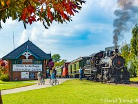 Having relocated from St. Thomas to Waterloo earlier in the 2007, the Southern Ontario Locomotive Restoration Society (SOLRS) initially ran excursions between Waterloo and St. Jacobs. The group brings their pride and joy, former Essex Terminal Railway 0-6-0 No. 9 out for special occasions a number of times a year. The Oktoberfest weekend is one of them. In this image the old steamer has some of the locals curiosity at the former Waterloo-St. Jacobs replica station in Waterloo as volunteers prep her for another trip north to the Farmers Market. Number 9 would not be able to make the trip due to a hot journal and would remain in Waterloo. <br>As of 2022 things have changed significantly. While the replica station still stands, installation of double track, catenary lines and a fence for the ION LRT have now forever changed this scene. Waterloo Central is based out of St. Jacobs and runs along CN's Waterloo Spur between Northfield Drive (where the ION branches off the Waterloo Spur's right-of-way) to Elmira.