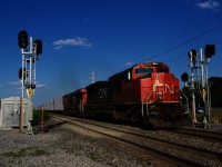 CN X377 is splitting a fairly new set of signals at MP 17.4 of CN's Kingston Sub. At left CN 122 is lined on the South Track.