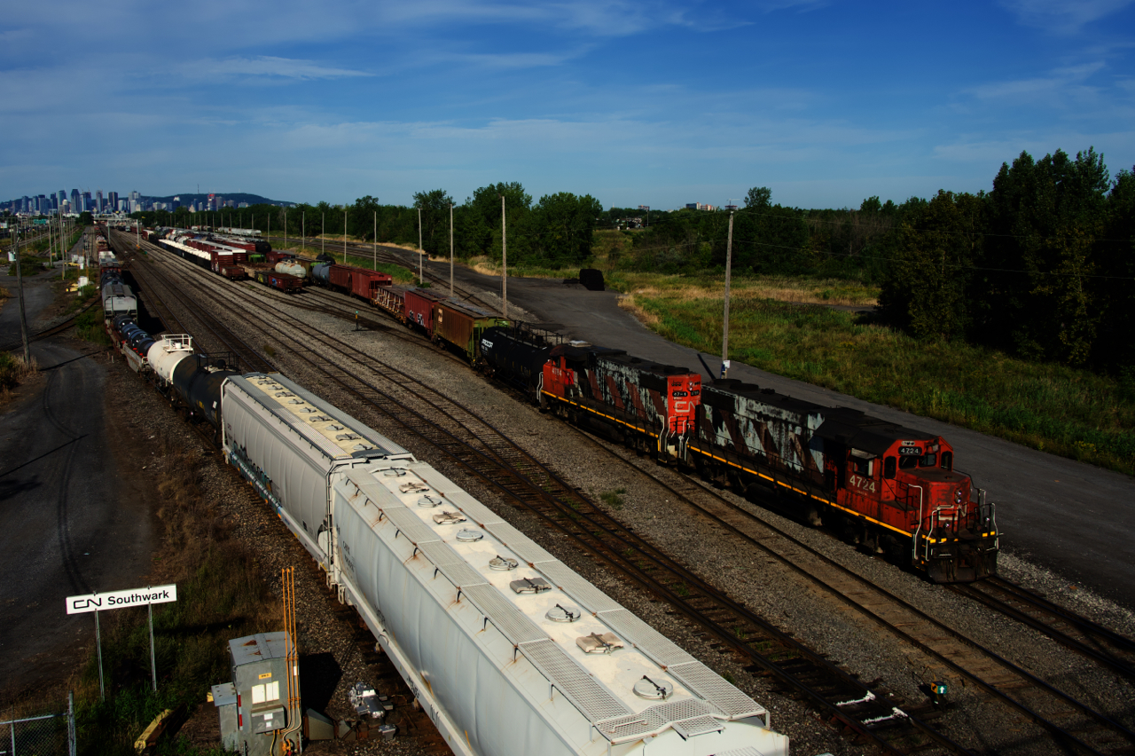CN 526 with a pair of beat up zebras switches Southwark Yard as CN 310 advances at left.