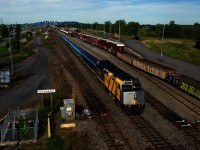 VIA 622 with wrapped VIA 6420 is passing CN 526, shoving into Southwark Yard at right. 
