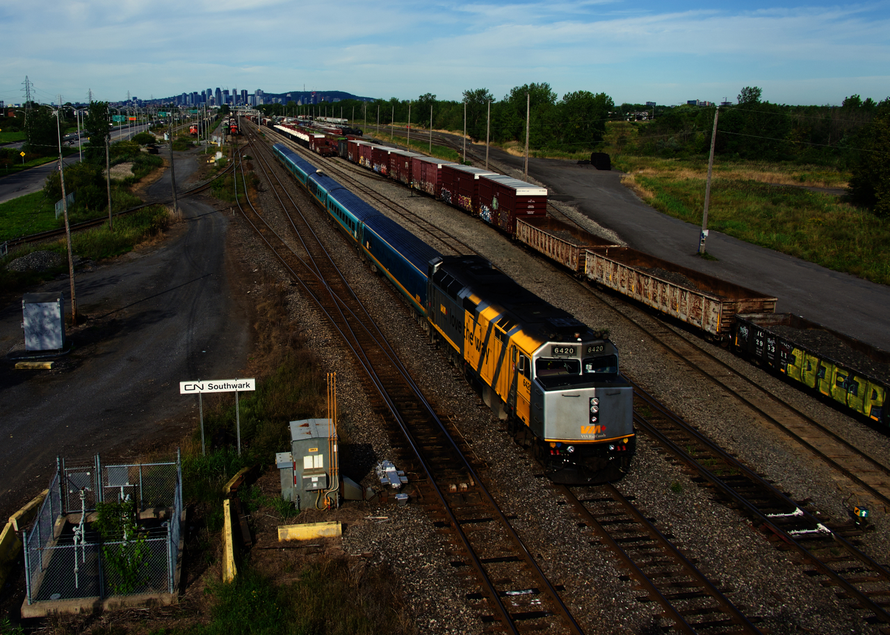 VIA 622 with wrapped VIA 6420 is passing CN 526, shoving into Southwark Yard at right.