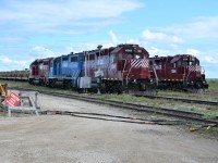 It is 16:00 hrs. on this bright, sunny, and cool August 4th afternoon when I find the Churchill, MB yard littered with idle power. HLCX 1041, LLPX 2605, & HLCX 1046 came in on the morning wayfreight, and HLCX 1084 is used on one of the GREX Dump Trains working out of the yard. VIA 6448's nose is just visible at the right of the frame as it sits powered down and receiving a transfusion from the 480-volt wayside power source.