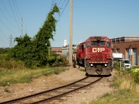 After making lift of two cars at Korex, CP 3118 & 2264 pull out of the Korex lead back up to Norseman Street for more work at Battenfeld.