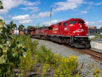 CP 9-420 winds around the west leg of the West Toronto wye with a bright & shiny CP 7002 leading CP 8031 and CN 3143. This train was delayed for hours as it traversed the Mactier sub and by the time it got to West Toronto, CP's West Tower asked them to dump the train in Lambton instead of going east to Agincourt. The result is this, the rare use of the West wye leg in daylight. To top it off, a recent return from AMP meant CP 7002 looked brand new, sparkling in the midday sun. 