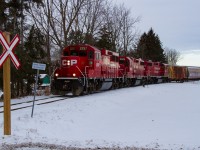 T72 shoves their way up the Ayr Pit Spur with a string of hoppers for the FS Partners mill in the namesake town of Ayr. 