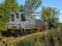 LDSX 7920, leased to GIO Rail, after switching WH yard for a while, headed out with three tank cars in tow that were likely headed to Jungbunzlauer Canada Inc., located just east of Elm St. where the photo was taken.  