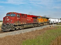 CP 9358 and BNSF 4024 head west on the Scotford Sub with CP's B81 local transfer from Scotford to Edmonton. Seen here crossing Twp Rd 552