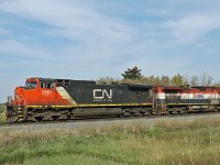 CN 2661 and BCOL 4642 make a light engine move into Scotford Yard.  They have been working at the Heartland Sulphur Terminal a couple of miles to the east and are returning to the yard shop tracks for a break.  Nice to see the old BC paint scheme, getting pretty rare these days.