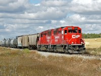 A pair of GP20C-ECO, CP 2275 and 2233 travel east on the Lacombe Sub with the Red Deer to Stettler local.  Seen here about to cross Hyw 11.