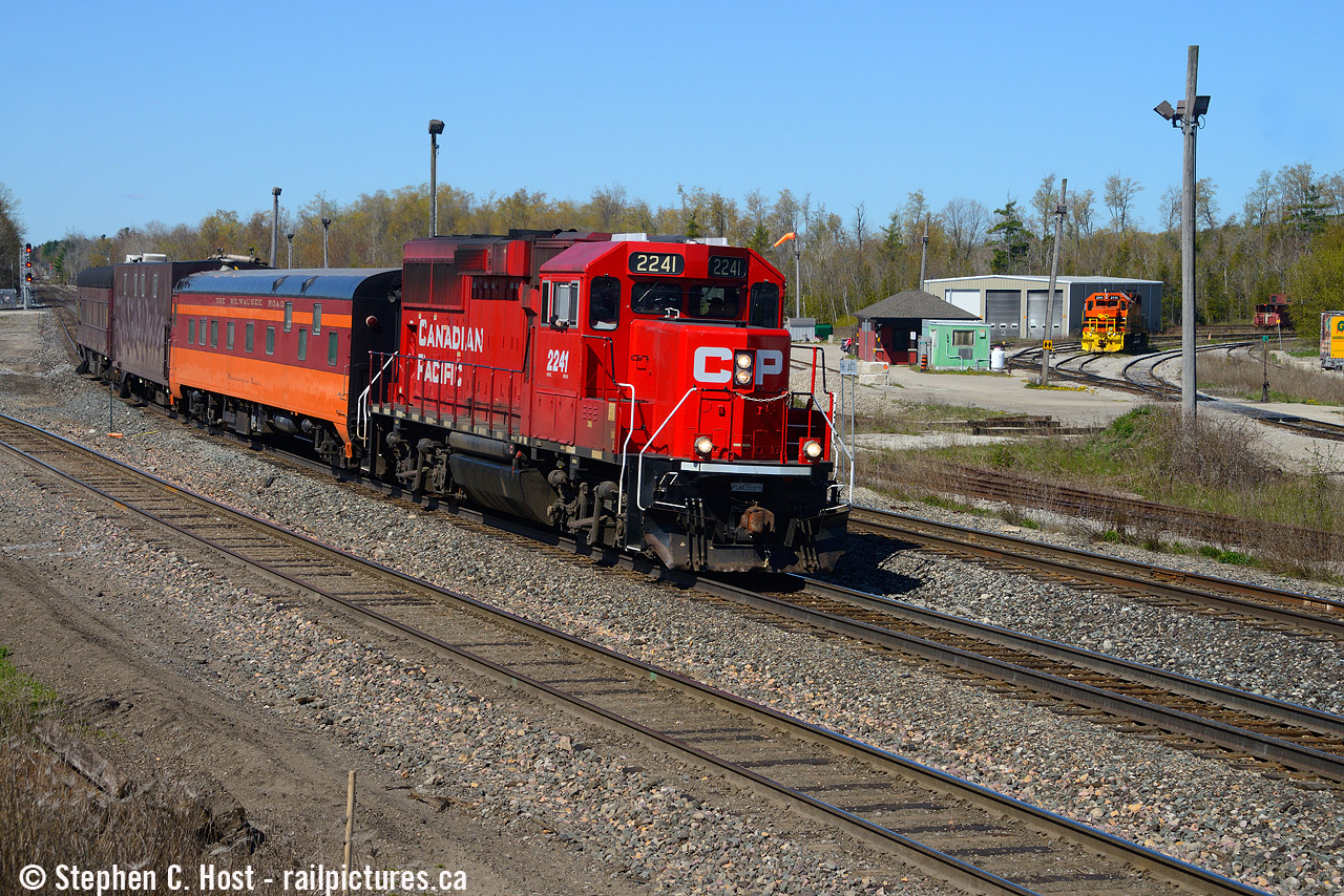 When I shot and followed this train due to the MILW sleeper car in the consist, I knew it would likely be a unique run worth the time due to the sleeper alone. Little did I know that this train set would be retired later that year once the new TEST train arrived. Both the Maroon and the stainless TEST cars are both retired, and are for sale on CP's surplus assets page (if not already sold). Fine by me as I had 20 years to shoot both sets and I got 'em multiple times. (Boy I wish I chased that one more..). Get your shots while you can....