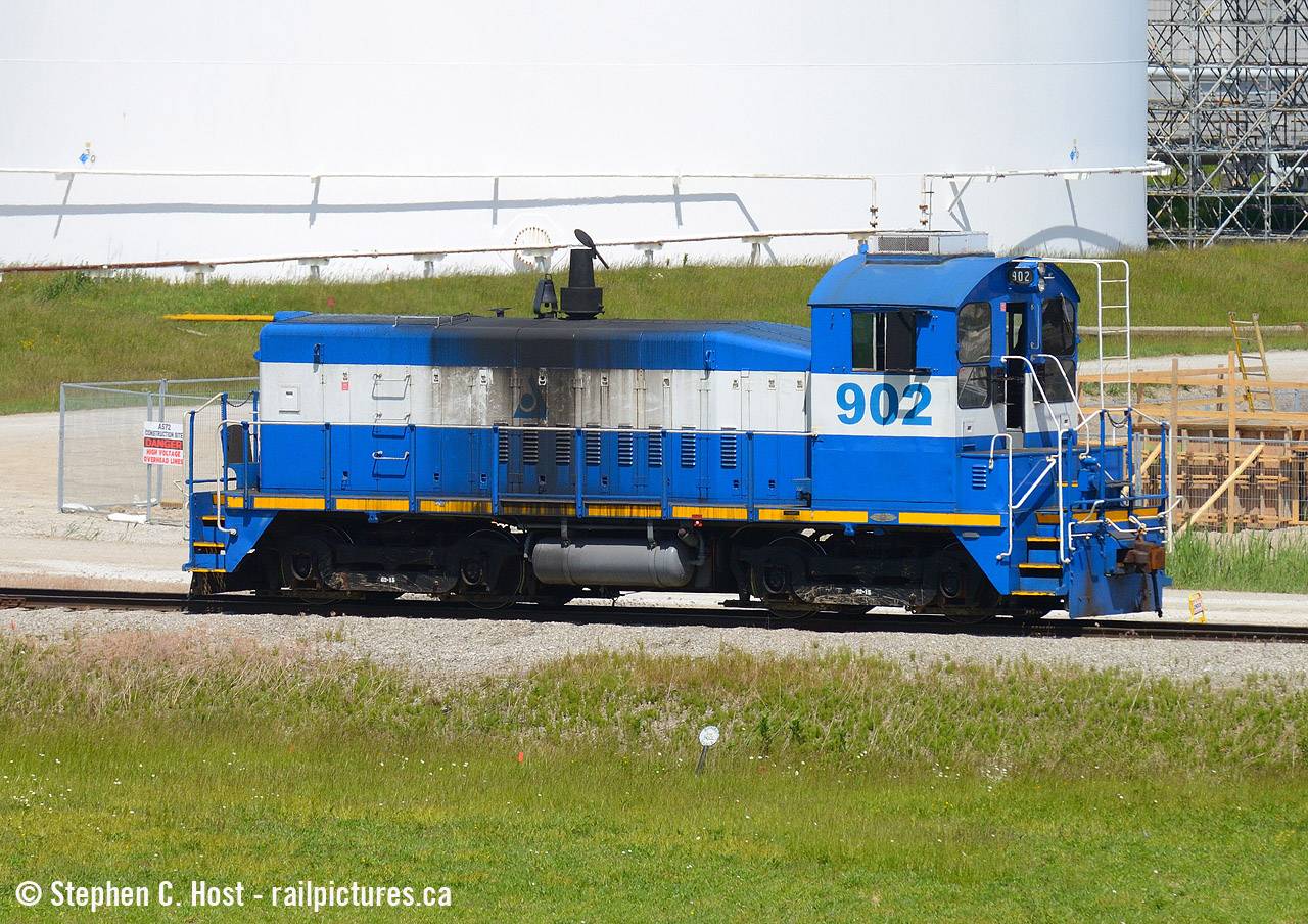 Near Corunna, a large Nova plant usually has one or two locomotives shootable from Highway 40. Sometimes three. But back in June 2020 NOVA 902 is seen at this facility, but if you do see it you are wise to get a shot: 902 is the floater unit used between all three plants when a unit is down for maintenance. Notice the original EMD number plate under the cab.