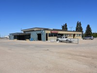VIA Rail's Saskatoon, SK station looks fresh and clean in the June 3, 2002 photo. I had stepped off of VIA #1 The Canadian, as I do at every stop, for some fresh air, walking exercise, and photos. Todays weather was amazing and allowed for some great shots at the station, on the platform, and of the CN yard and maintenance complex.