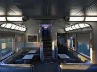 It's not the Stairway to Heaven but it sure was an enjoyable climb every time I went up into the dome level of VIA 8515 Skyline on VIA #693. It's 05:38 and the train is 3 hours & 20 minutes (67 miles) south of Churchill, MB. There's no one else in the Skyline car but me and a VIA on-board attendant who was making a fresh carafe of coffee. A fresh cooked breakfast is still an hour and a half away. There's not much to look at outside as we rumble north, but it's amazing how interesting every mile of barren, tree pegged tundra and mirror like lakes can be from this elevated vantage point.