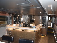 After boarding VIA #1 The Canadian in Toronto, checking into my room, and getting my safety briefing, I headed to the rear of the train to watch the departure from Union Station in the dome of VIA 88709 Laurentide Park. Prior to getting to the bullet end of the car, and the curved staircase leading to the upper level, one has to pass by the very inviting, well appointed, and well stocked bar area. The attendants here offer top level attention & service to guests in Sleeper Plus and Prestige Class, and they mix mighty fine drinks as well! :-) You can enjoy water, juice, pop, coffee/tea, or just about any kind of adult beverage you can think of, here or upstairs while you watch the scenery of five different Provinces pass by. Not a bad way to spend a few days and nights at any time of the year.