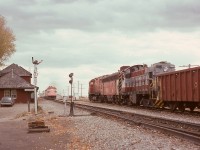 In 1974, ABS-signalled double track extended east from Calgary to Gleichen, requiring a 24/7 train order office there.  On Wednesday 1974-10-02, an eastward freight extra with 4234 and 4478 for power and dead MLW S-3 6573 enroute overhaul at Winnipeg waited for No. 1 The Canadian with 1412 and 1408 to arrive, which it did on time, of course.
