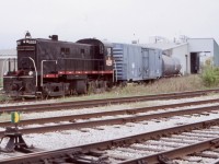 RS23 506 was the main power for the short lived “Guelph Junction Express “ it even wore a Sleman logo for a period as it was a major sponsor. The recession of the mid to late 2000’s found the RS23’s operating most trains as they were less fuel hungry then the larger RS18’s, and if one RS23 was enough power for the train to Guelph, a solo unit would only be used. Here 506 grabs a tank car from the wood treatment building at Goodfellow lumber. Today this no longer happens as the track is long out of service and covered by a gravel access road. 